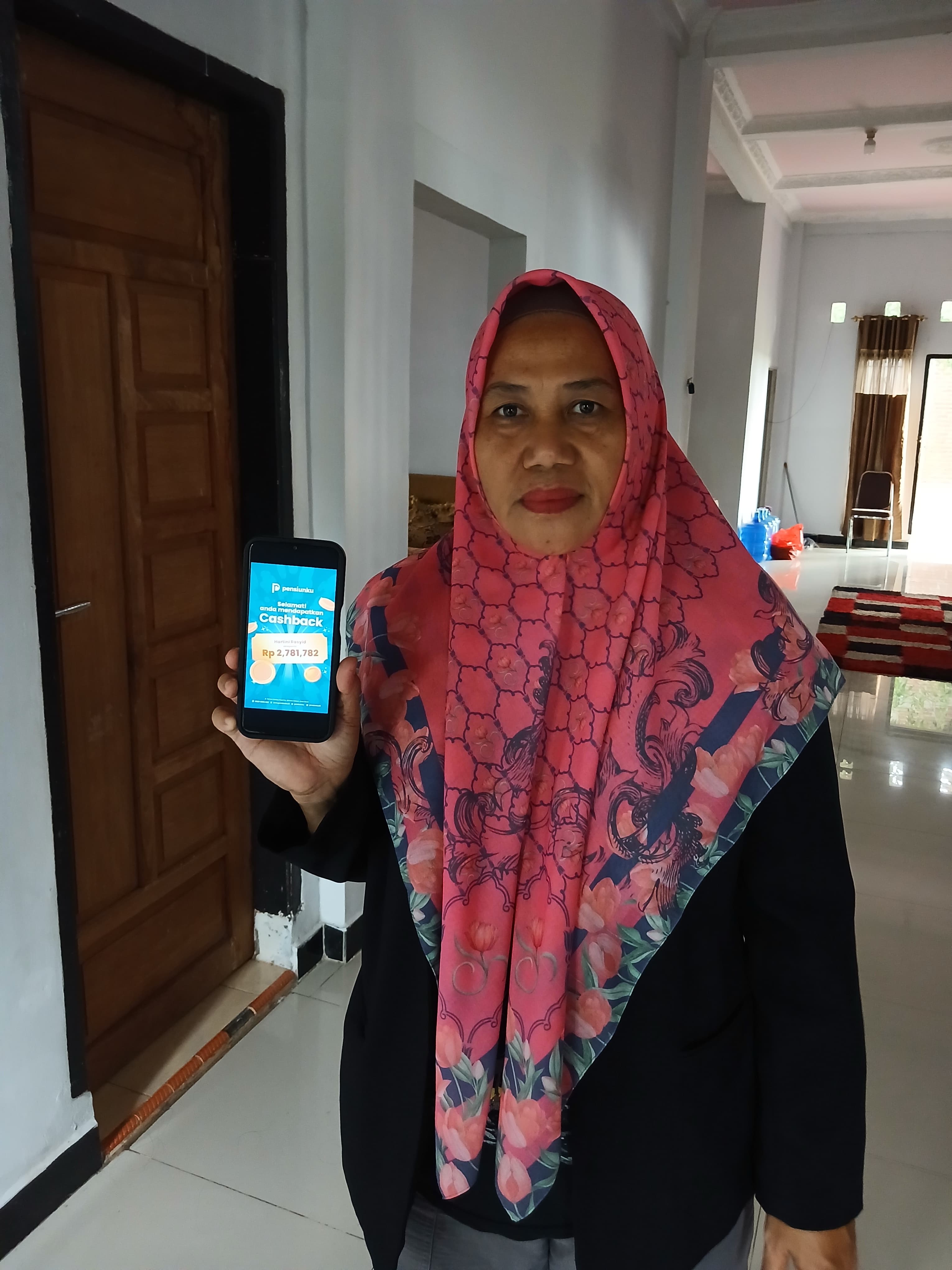 Hartini Rasyid (52)